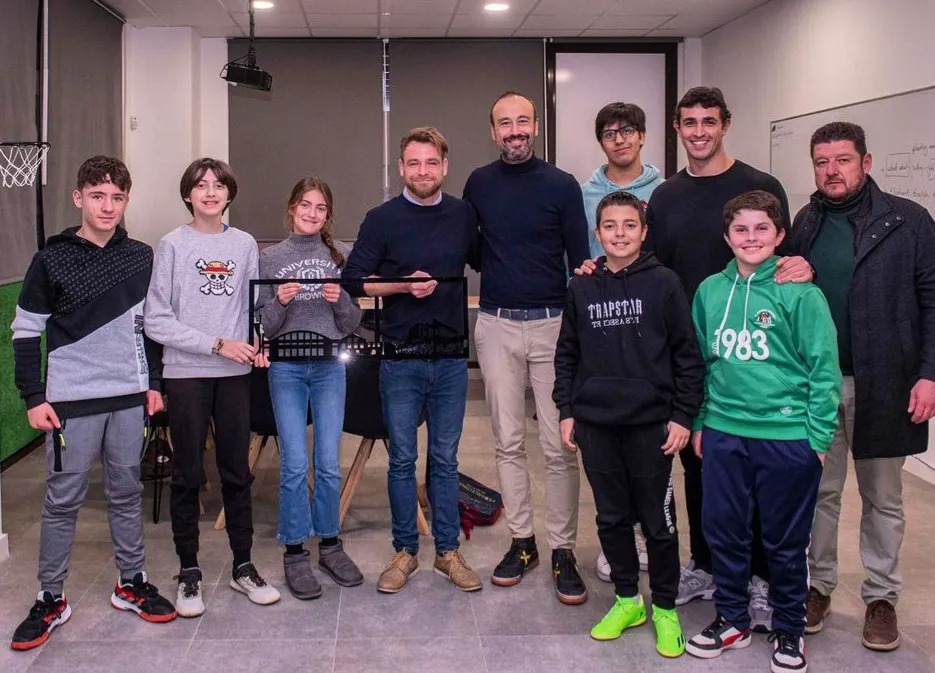 Jamie Russell with students at Elephant English Academy